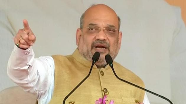 BJP President Amit Shah addressing a public meeting in Godda, Jharkhand on March 5. (ANI/Reuters Photo)(ANI)