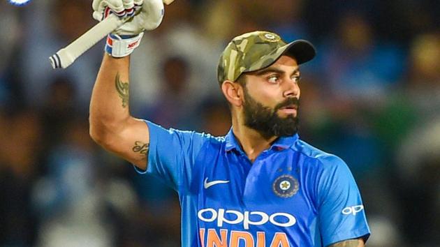 Ranchi: Indian skipper Virat Kohli acknowledges the crowd after hitting a century during the 3rd ODI cricket match against Australia.(PTI)