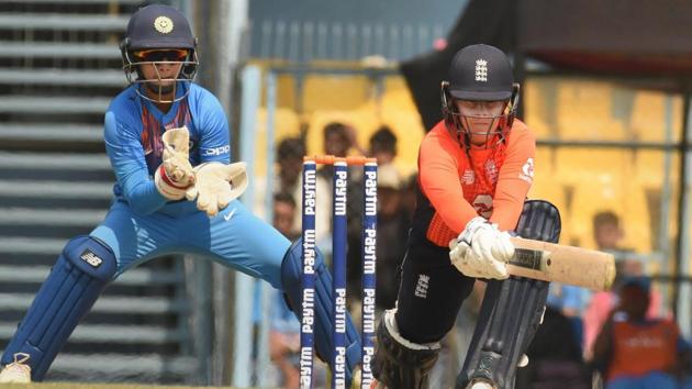 England’s Tammy Beaumont plays a shot during the third T20.(PTI)