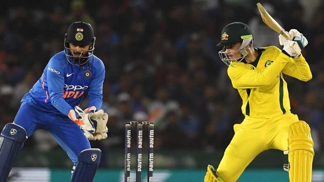 India wicket keeper Rishabh Pant (L) watches as Australia cricketer Peter Handscomb (R) plays a shot. (AFP) India wicket keeper Rishabh Pant (L) watches as Australia cricketer Peter Handscomb (R) plays a shot. (AFP)