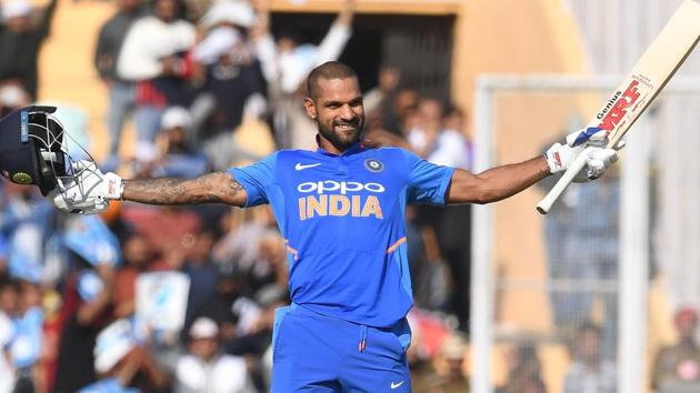 India cricketer Shikhar Dhawan raises his bat after his century. (AFP) India cricketer Shikhar Dhawan raises his bat after his century. (AFP)