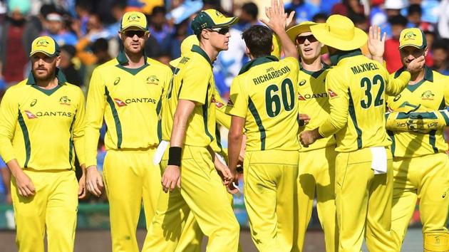 Australia cricketers celebrate the wicket of India cricketer Rohit Sharma. (AFP) Australia cricketers celebrate the wicket of India cricketer Rohit Sharma. (AFP)