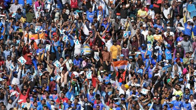Cricket enthusiasts cheer during the 4th ODI cricket match between India and Australia. (PTI) Cricket enthusiasts cheer during the 4th ODI cricket match between India and Australia. (PTI)