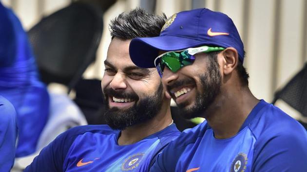 File image of India cricketer Jasprit Bumrah and Virat Kohli (L).(PTI)