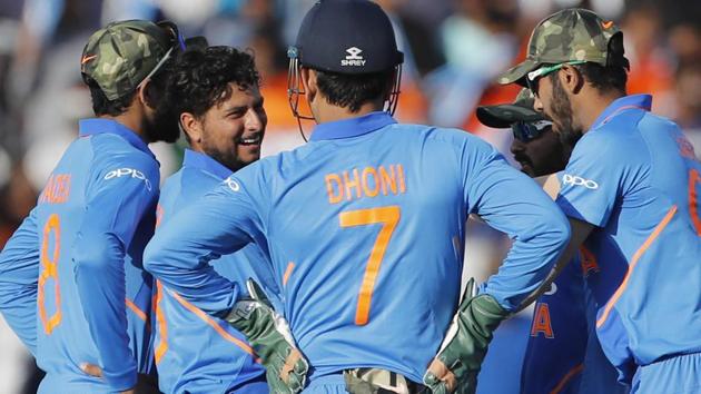Kuldeep Yadav, second left, celebrates with teammates the dismissal of Australia's Peter Handscomb. (AP) Kuldeep Yadav, second left, celebrates with teammates the dismissal of Australia's Peter Handscomb. (AP)