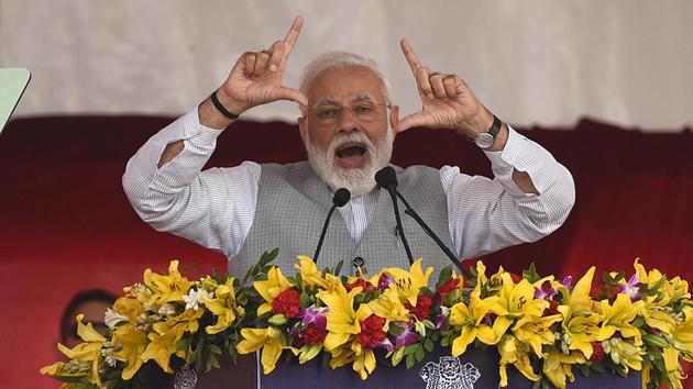 Prime Minister Narendra Modi addresses the audience after inaugurating development projects, in Greater Noida.(Virendra Singh Gosain/HT PHOTO)
