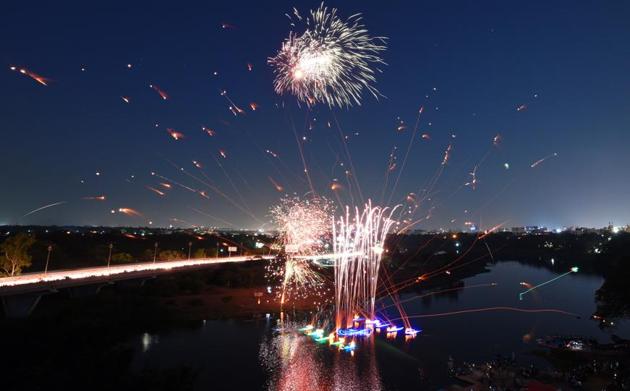 The action packed events, that took place on the Mula river, witnessed fire works late in the evening, as the sun set for the day. (Pratham Gokhale/HT Photo) The action packed events, that took place on the Mula river, witnessed fire works late in the evening, as the sun set for the day. (Pratham Gokhale/HT Photo)