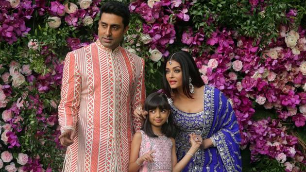 Actor Abhishek Bachchan, his wife actor Aishwarya Rai and their daughter Aaradhya at the wedding ceremony of Akash Ambani.(REUTERS)