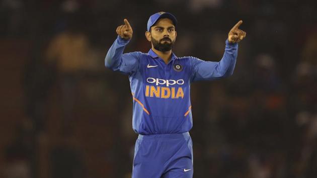 India's captain Virat Kohli directs his teammates to their fielding positions during the fourth one day international cricket match between India and Australia in Mohali (AP) India's captain Virat Kohli directs his teammates to their fielding positions during the fourth one day international cricket match between India and Australia in Mohali (AP)