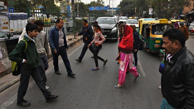 The walkways, wherever provided, are often too narrow and without facilities such as public toilets, signage, road markings, zebra lanes, bus shelter, trees, benches, etc.(Raj K Raj/HT Photo) The walkways, wherever provided, are often too narrow and without facilities such as public toilets, signage, road markings, zebra lanes, bus shelter, trees, benches, etc.(Raj K Raj/HT Photo)