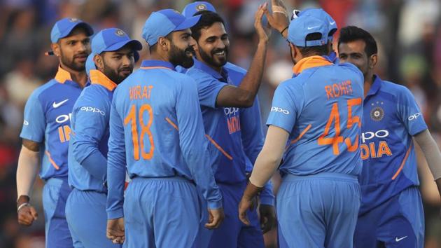 Bhuvneshwar Kumar, center without cap, celebrates with teammates the dismissal of Australia's captain Aaron Finch. (AP) Bhuvneshwar Kumar, center without cap, celebrates with teammates the dismissal of Australia's captain Aaron Finch. (AP)
