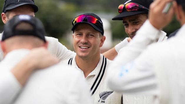 New Zealand's Neil Wagner (C) huddles with teammates during day five of the second cricket Test match between New Zealand and Bangladesh at the Basin Reserve in Wellington on March 12, 2019(AFP)