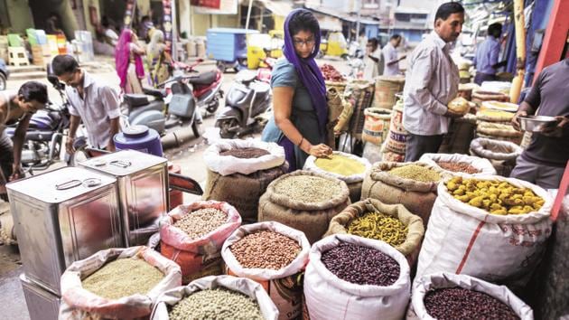 A customer shops for pulses in a store at a local market in Hyderabad, India.(Bloomberg)