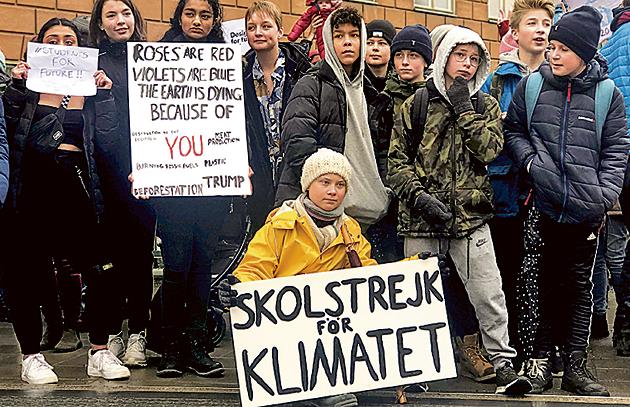 Greta Thunberg (yellow jacket) at a protest next to Sweden’s Parliament in Stockholm on March 8, 2019. (Reuters) Greta Thunberg (yellow jacket) at a protest next to Sweden’s Parliament in Stockholm on March 8, 2019. (Reuters)