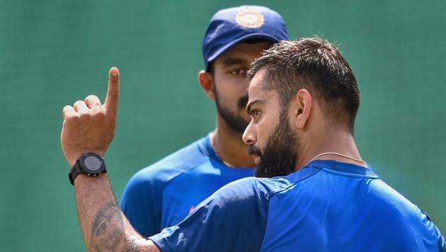 Skipper Virat Kohli talks to Vijay Shankar during a practice session ahead of the 2nd ODI cricket match against Australia, at Vidarbha Cricket Association Stadium in Nagpur, Monday, March 4, 2019.(PTI)