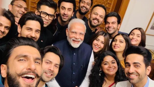PM Narendra Modi with a contingent of Bollywood actors and filmmakers in Delhi.