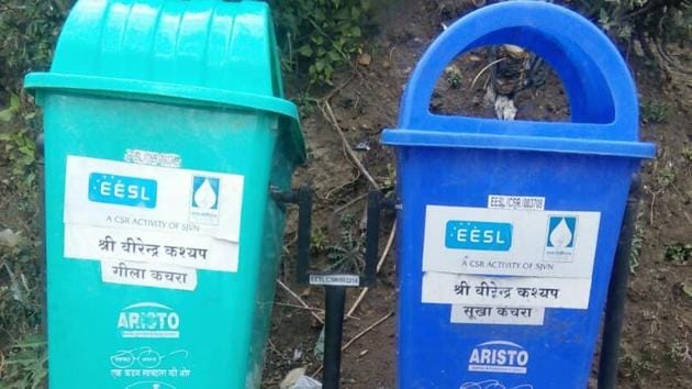 Over 6,000 dustbins across Himachal Pradesh display names of BJP Lok Sabha members which has led the state Congress to ask EC to remove the bins.(HT Photo)