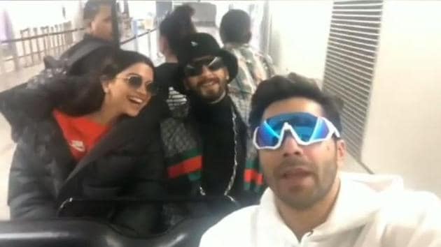 Varun Dhawan with Deepika Padukone and Ranveer Singh on his way to London.