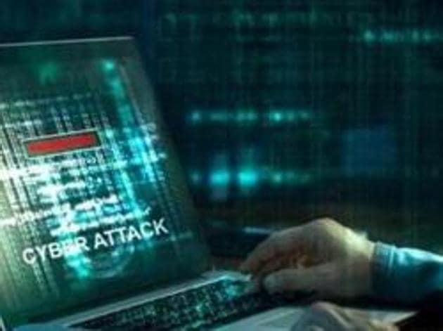 Computer hacker. Internet crime working on a code on laptop screen with dark digital background. Cyber attack in cyberspace concept(Getty Images/iStockphoto) Computer hacker. Internet crime working on a code on laptop screen with dark digital background. Cyber attack in cyberspace concept(Getty Images/iStockphoto)