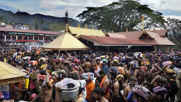 Devotees celebrate Makaravilakku day in Sabarimala in January. (PTI) Devotees celebrate Makaravilakku day in Sabarimala in January. (PTI)
