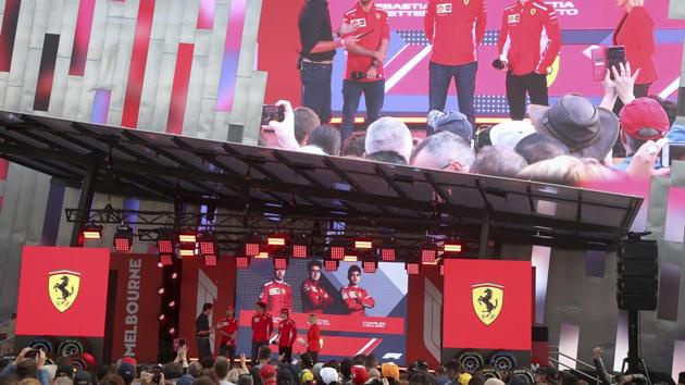 Sebastian Vettel of Germany, second left, teammate Charles Leclerc of Monaco, second right, and team principal Mattia Binotto. (AP) Sebastian Vettel of Germany, second left, teammate Charles Leclerc of Monaco, second right, and team principal Mattia Binotto. (AP)