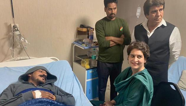 Meerut: Congress General Secretary Priyanka Gandhi Vadra visits Bhim Army chief Chandrashekhar Azad at a hospital, in Meerut on Wednesday.(PTI Photo)