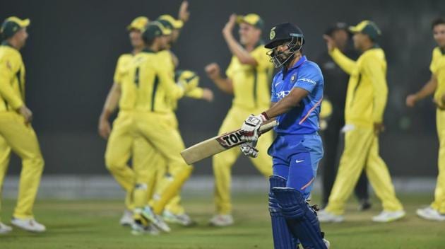 Kedar Jadhav walks back to the pavilion after his dismissal.(AP)