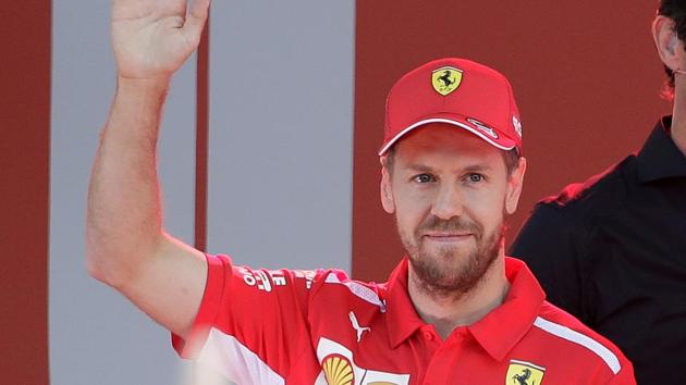 Ferrari driver Sebastian Vettel of Germany waves during the launch for the Australian Grand Prix in Melbourne, Australia, Wednesday.(AP) Ferrari driver Sebastian Vettel of Germany waves during the launch for the Australian Grand Prix in Melbourne, Australia, Wednesday.(AP)