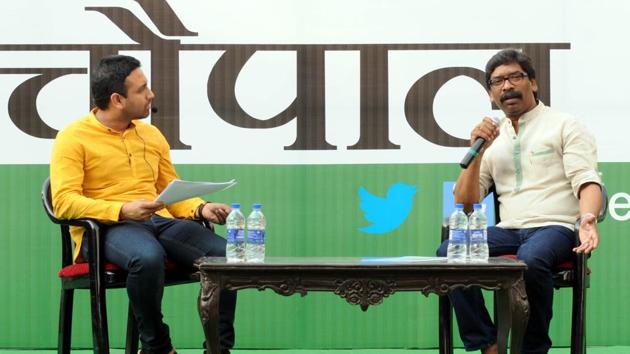 Former chief minister Hemant Soren replying questions of public during the programme "Hemant- Ki - Chaupal" and programme anchored by JMM MLA Kunal Sarangi (left) in Ranchi(Diwakar Prasad/ Hindustan Times)