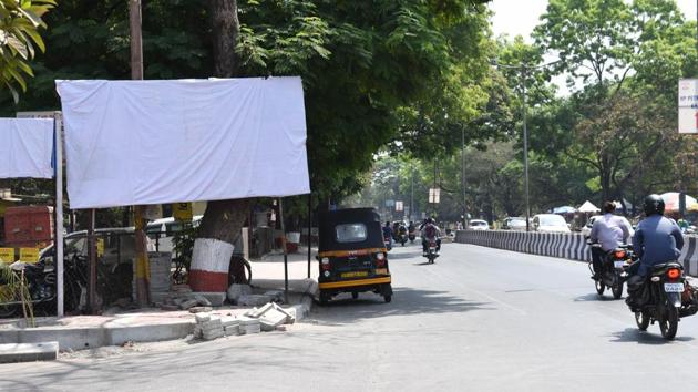 Pune, India -Wednesday,March,13,2019 in view of the announcement of the dates for elections to Lok Sabha, the political parties temporary covered existing sign boards and flex in various parts of the city.photo at Aundh -Khadki raod near HDFC khadki branch in Pune, India, on Wednesday,March, 13, 2019. (HT PHOTO) 