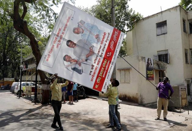 The EC has devised several mechanisms to take note of the offences, which include joint task forces of enforcement agencies and flying squads. The introduction of the cVIGIL mobile app through which audio-visual evidence of malpractices can be reported is the latest step. (RAHUL RAUT/HT PHOTO) 