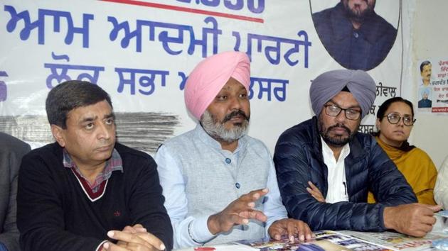 AAP MLA Harpal Singh Cheema addressing a press conference in Amritsar on Friday.(HT Photo)