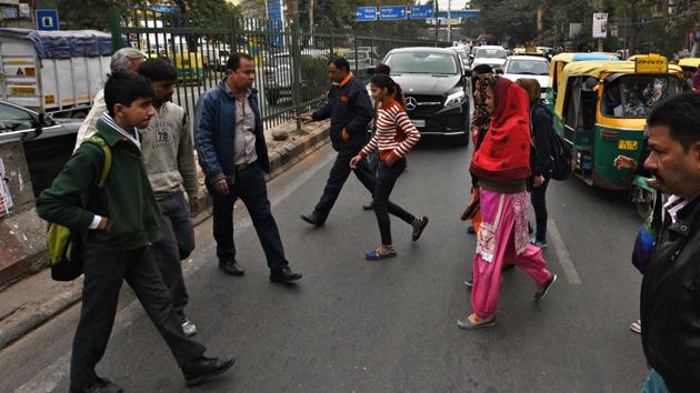 Walkability on streets is to be ensured by providing a continuous, levelled and barrier-free path for walking along and across the streets.(HT Photo)