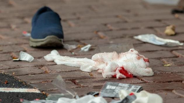 Bloodied bandages on the road following a shooting at the Al Noor mosque in Christchurch, New Zealand.(Reuters)