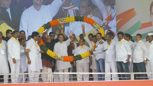 Congress President Rahul Gandhi being garlanded by party leaders at a public meeting in Sarsara, during his Odisha visit on Friday.(ANI)