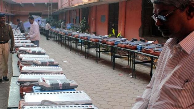 Electronic voting machines being checked ahead an election.(Shankar Mourya/HT Photo)