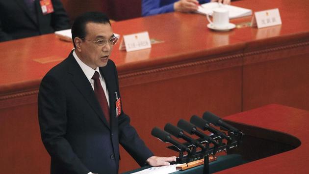 Chinese Premier Li Keqiang delivers the work reports at the opening session of the China's National People's Congress at the Great Hall of the People in Beijing on March 5ng) (AP) Chinese Premier Li Keqiang delivers the work reports at the opening session of the China's National People's Congress at the Great Hall of the People in Beijing on March 5ng) (AP)