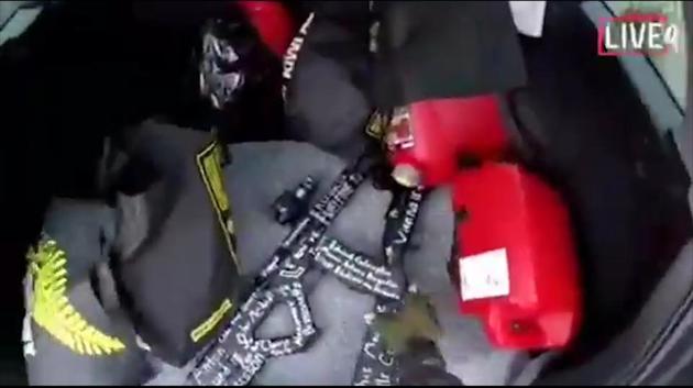 A videograb from the alleged shooter’s video shows a gun in his vehicle. Footage widely circulated on social media, apparently taken by a gunman and posted online live as the attack unfolded, showed him driving to one mosque, entering it and shooting randomly. Worshippers, possibly dead or wounded, lay huddled on the floor of the mosque. Reuters was unable to confirm the authenticity of the footage. (AP) A videograb from the alleged shooter’s video shows a gun in his vehicle. Footage widely circulated on social media, apparently taken by a gunman and posted online live as the attack unfolded, showed him driving to one mosque, entering it and shooting randomly. Worshippers, possibly dead or wounded, lay huddled on the floor of the mosque. Reuters was unable to confirm the authenticity of the footage. (AP)