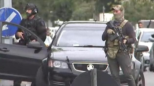 An image grab from TV New Zealand taken on March 15, 2019 shows armed New Zealand special forces arriving outside the mosque following a shooting in Christchurch(AFP)