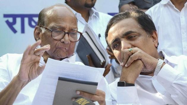 Mumbai: Nationalist Congress Party chief Sharad Pawar and state NCP chief Jayant Patil during announcement the Lok Sabha candidates, in Mumbai.(PTI Photo)