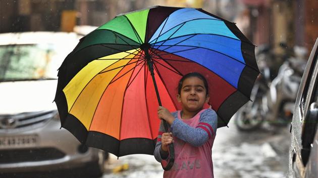 According to IMD scientists, Thursday’s rain was a result of a western disturbance in the western Himalayan region on Wednesday and Thursday.(Raj K Raj/HT Photo)