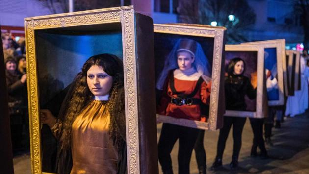 Costumed revelers perform in a carnival procession on the streets of Strumica, Macedonia, during the great evening carnival which marks the beginning of the Christian Orthodox Lent. (Robert Atanasovski / AFP) Costumed revelers perform in a carnival procession on the streets of Strumica, Macedonia, during the great evening carnival which marks the beginning of the Christian Orthodox Lent. (Robert Atanasovski / AFP)