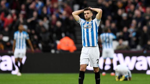 Huddersfield Town's Tommy Smith reacts after losing to West Ham.(Reuters)