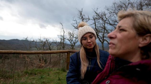 Arelis Morales, 30, and her husband Jose's aunt talk at the Monasterio de Trandeiras, Xinzo de Limia, Spain. Until January, Jose Martinez and his wife Arelis Morales were in the eye of Venezuela’s political storm: he worked for an opposition leader, she advised human rights groups. (Ana Maria Arevalo Gosen / REUTERS) Arelis Morales, 30, and her husband Jose's aunt talk at the Monasterio de Trandeiras, Xinzo de Limia, Spain. Until January, Jose Martinez and his wife Arelis Morales were in the eye of Venezuela’s political storm: he worked for an opposition leader, she advised human rights groups. (Ana Maria Arevalo Gosen / REUTERS)