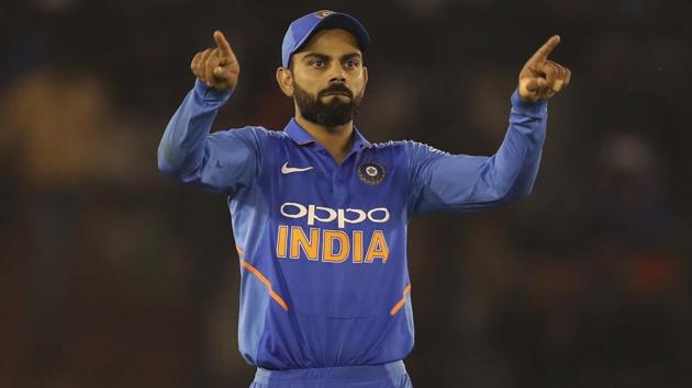 Virat Kohli directs his teammates to their fielding positions. (AP) Virat Kohli directs his teammates to their fielding positions. (AP)