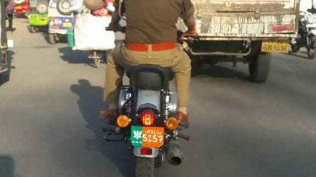 FIR against SI for flaunting ruling party flag on number plate ...