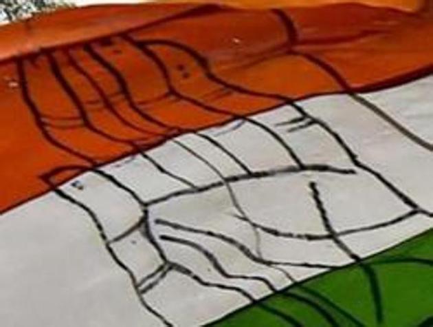 New Delhi: A Congress party supporter waves party flag after party's win in the Assembly elections in Rajasthan, Chhattisgarh and Madhya Pradesh, at the party headquarters in New Delhi, Tuesday, Dec 11, 2018. (PTI Photo/Ravi Choudhary) (PTI12_11_2018_000262A) (PTI) New Delhi: A Congress party supporter waves party flag after party's win in the Assembly elections in Rajasthan, Chhattisgarh and Madhya Pradesh, at the party headquarters in New Delhi, Tuesday, Dec 11, 2018. (PTI Photo/Ravi Choudhary) (PTI12_11_2018_000262A) (PTI)