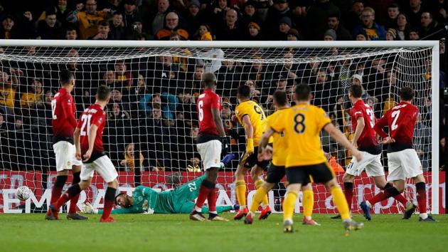 Wolverhampton Wanderers' Raul Jimenez scores their first goal.(REUTERS)