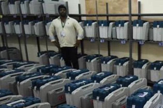 Polling staff checking Electronic Voting Machines in Bengaluru.(HT file photo)