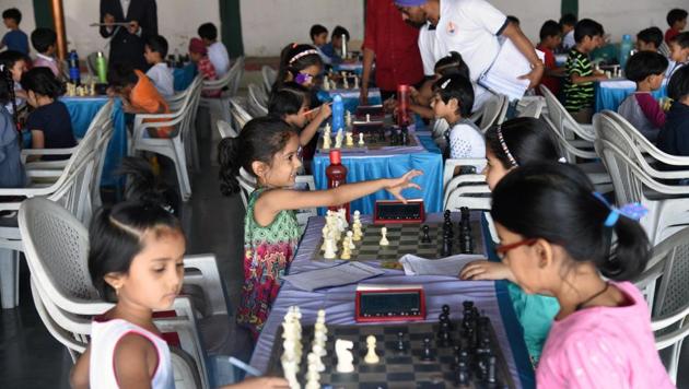 Participants belonging to under-7 age category in action on the first day of late Shikshanmaharshi Shivajirao Konde Memorial Maharashtra state selection under-7 chess championship played at Khed Shivapur. (Pratham Gokhale/HT Photo)
